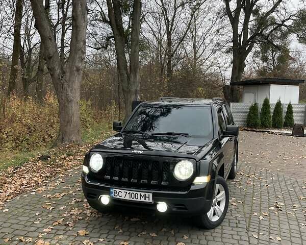 Черный Джип Патриот, объемом двигателя 2.4 л и пробегом 88 тыс. км за 10000 $, фото 1 на Automoto.ua