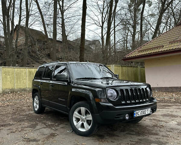Черный Джип Патриот, объемом двигателя 2.36 л и пробегом 32 тыс. км за 11200 $, фото 1 на Automoto.ua