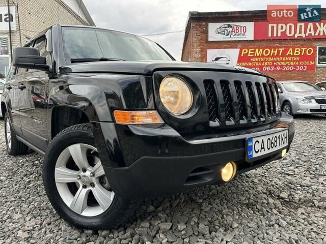 Чорний Джип Patriot, об'ємом двигуна 2.36 л та пробігом 224 тис. км за 11900 $, фото 1 на Automoto.ua