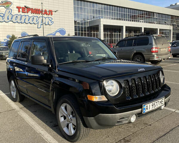 Черный Джип Патриот, объемом двигателя 2.36 л и пробегом 99 тыс. км за 11500 $, фото 1 на Automoto.ua