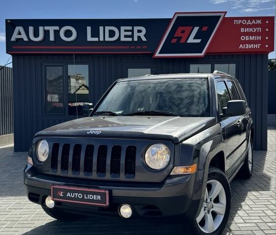 Чорний Джип Patriot, об'ємом двигуна 2.4 л та пробігом 216 тис. км за 9900 $, фото 1 на Automoto.ua