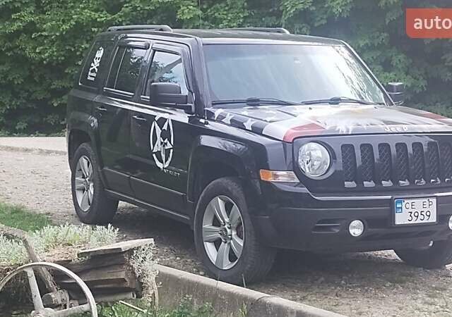 Чорний Джип Patriot, об'ємом двигуна 2.36 л та пробігом 167 тис. км за 9500 $, фото 1 на Automoto.ua