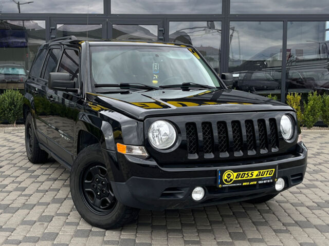 Черный Джип Патриот, объемом двигателя 2.4 л и пробегом 200 тыс. км за 9800 $, фото 1 на Automoto.ua