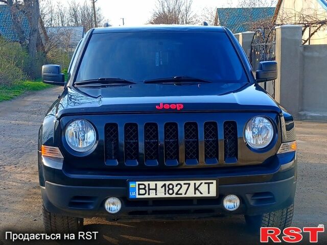 Черный Джип Патриот, объемом двигателя 2 л и пробегом 114 тыс. км за 11500 $, фото 1 на Automoto.ua