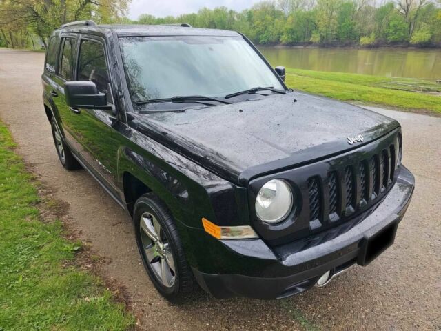 Чорний Джип Patriot, об'ємом двигуна 2.4 л та пробігом 60 тис. км за 11500 $, фото 1 на Automoto.ua
