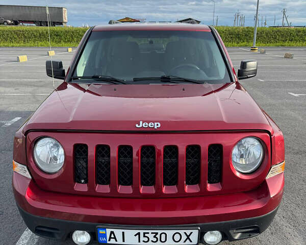 Красный Джип Патриот, объемом двигателя 2.36 л и пробегом 150 тыс. км за 8300 $, фото 1 на Automoto.ua