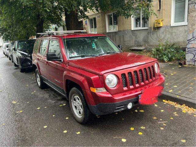 Красный Джип Патриот, объемом двигателя 2.4 л и пробегом 149 тыс. км за 8900 $, фото 1 на Automoto.ua