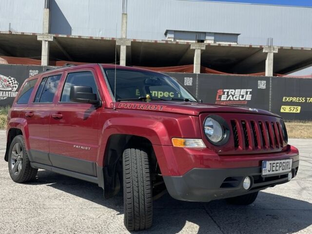 Червоний Джип Patriot, об'ємом двигуна 2.4 л та пробігом 253 тис. км за 8900 $, фото 1 на Automoto.ua