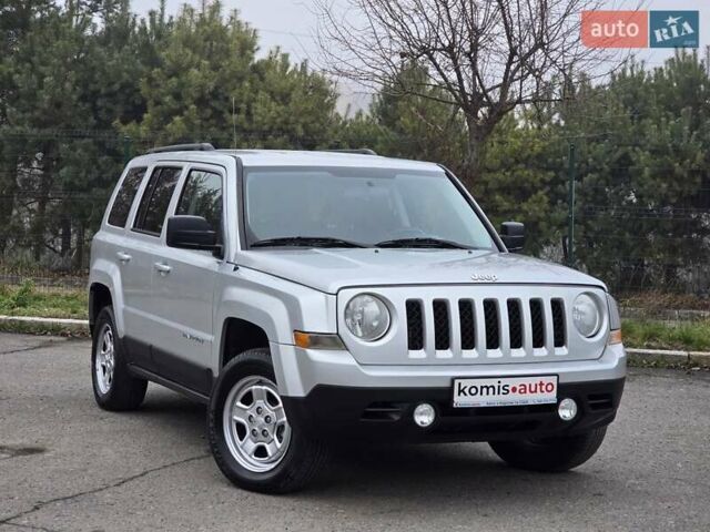 Серый Джип Патриот, объемом двигателя 2.4 л и пробегом 240 тыс. км за 7499 $, фото 1 на Automoto.ua