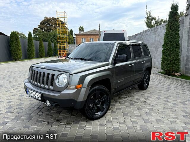 Серый Джип Патриот, объемом двигателя 2.4 л и пробегом 132 тыс. км за 11500 $, фото 1 на Automoto.ua