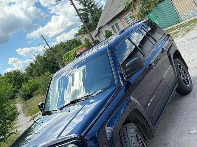 Синій Джип Patriot, об'ємом двигуна 2.36 л та пробігом 173 тис. км за 11200 $, фото 1 на Automoto.ua