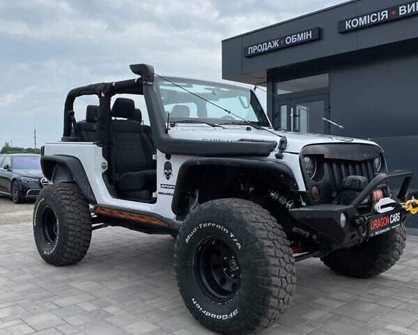 Білий Джип Wrangler, об'ємом двигуна 3.8 л та пробігом 147 тис. км за 22588 $, фото 1 на Automoto.ua