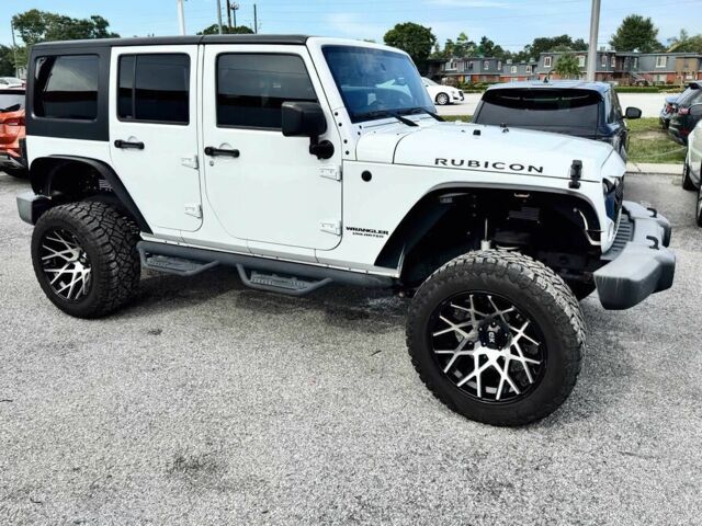 Білий Джип Wrangler, об'ємом двигуна 3.6 л та пробігом 65 тис. км за 5650 $, фото 1 на Automoto.ua