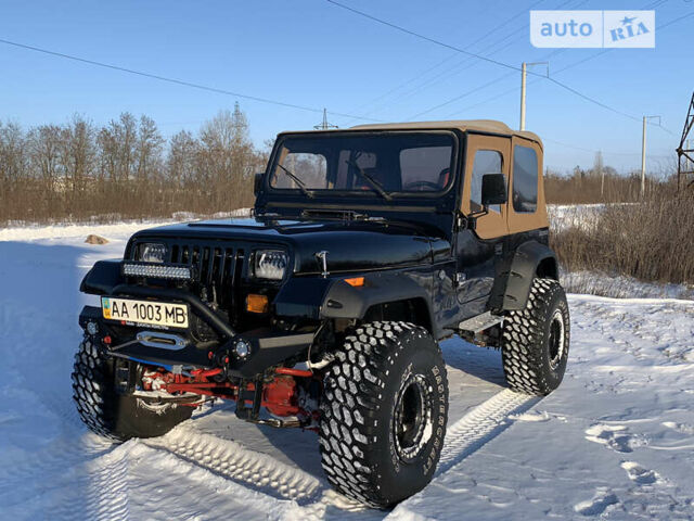 Чорний Джип Wrangler, об'ємом двигуна 4.2 л та пробігом 88 тис. км за 16800 $, фото 1 на Automoto.ua