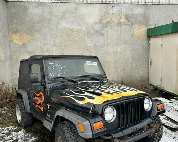 Чорний Джип Wrangler, об'ємом двигуна 2.4 л та пробігом 169 тис. км за 8200 $, фото 1 на Automoto.ua