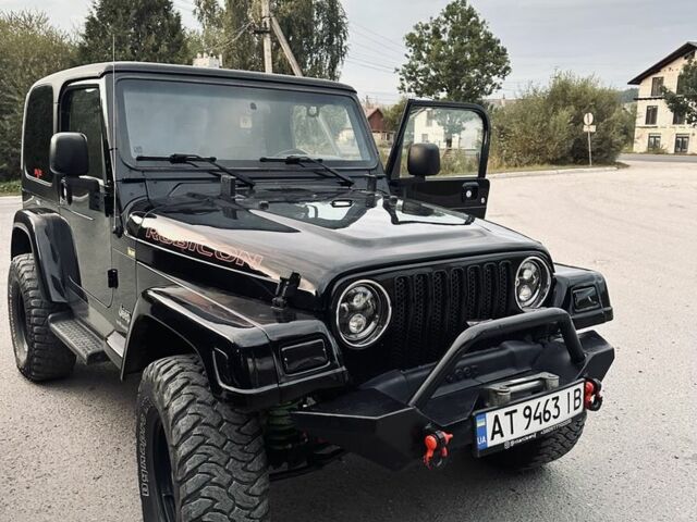 Чорний Джип Wrangler, об'ємом двигуна 4 л та пробігом 118 тис. км за 18900 $, фото 1 на Automoto.ua