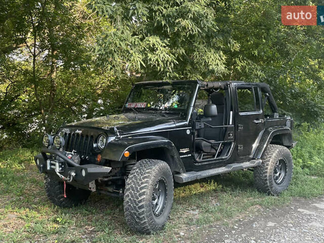 Черный Джип Вранглер, объемом двигателя 3.6 л и пробегом 226 тыс. км за 32000 $, фото 1 на Automoto.ua