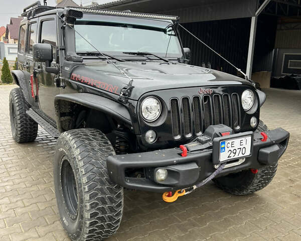 Чорний Джип Wrangler, об'ємом двигуна 3.6 л та пробігом 40 тис. км за 49000 $, фото 1 на Automoto.ua