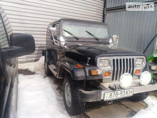 Чорний Джип Wrangler, об'ємом двигуна 2.5 л та пробігом 174 тис. км за 7500 $, фото 1 на Automoto.ua