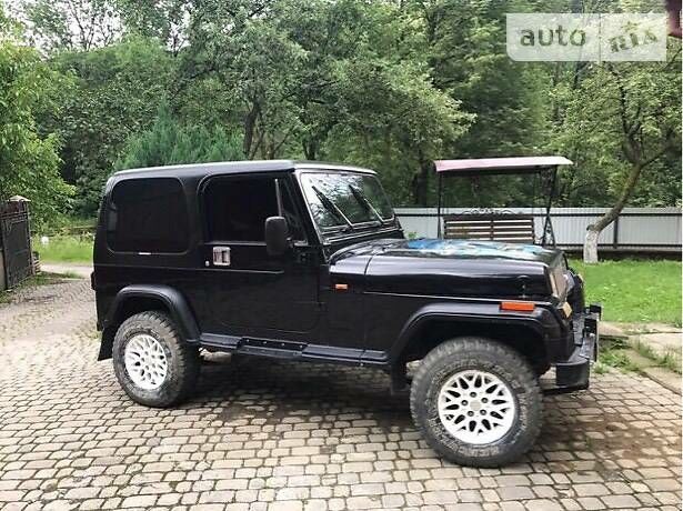 Чорний Джип Wrangler, об'ємом двигуна 2.5 л та пробігом 268 тис. км за 8200 $, фото 1 на Automoto.ua