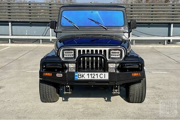 Чорний Джип Wrangler, об'ємом двигуна 2.5 л та пробігом 5 тис. км за 12500 $, фото 1 на Automoto.ua