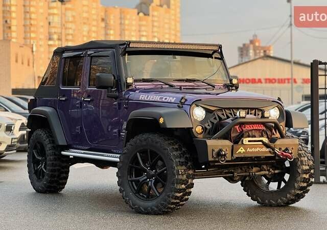 Фиолетовый Джип Вранглер, объемом двигателя 3.6 л и пробегом 70 тыс. км за 39500 $, фото 1 на Automoto.ua