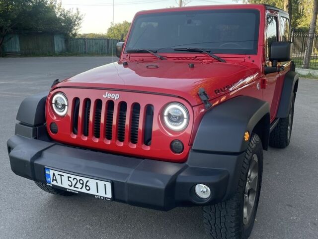 Красный Джип Вранглер, объемом двигателя 2.8 л и пробегом 100 тыс. км за 32999 $, фото 1 на Automoto.ua