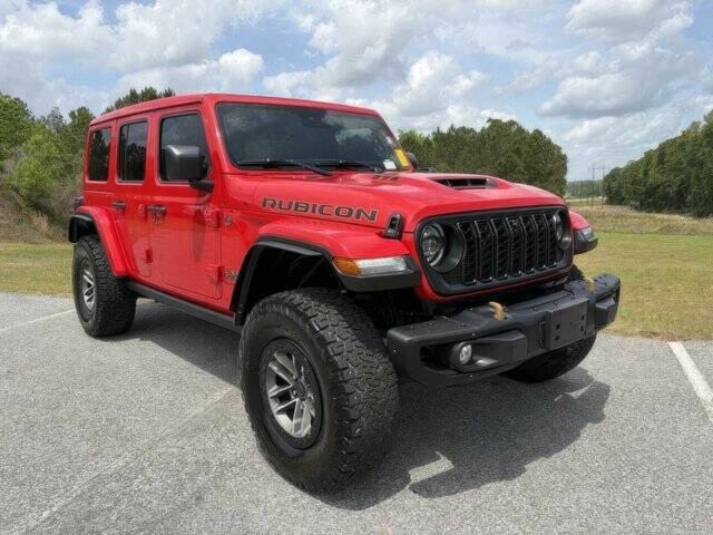 Червоний Джип Wrangler, об'ємом двигуна 6.4 л та пробігом 16 тис. км за 15000 $, фото 1 на Automoto.ua