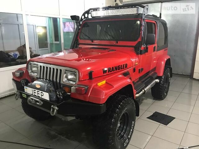 Червоний Джип Wrangler, об'ємом двигуна 4 л та пробігом 147 тис. км за 17500 $, фото 1 на Automoto.ua