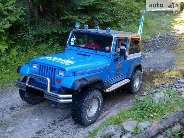 Синій Джип Wrangler, об'ємом двигуна 4 л та пробігом 120 тис. км за 12500 $, фото 1 на Automoto.ua