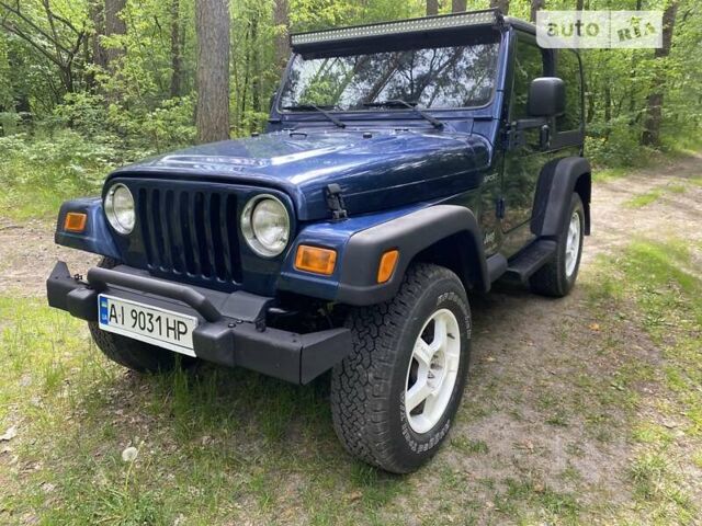 Синій Джип Wrangler, об'ємом двигуна 2.4 л та пробігом 193 тис. км за 11900 $, фото 1 на Automoto.ua