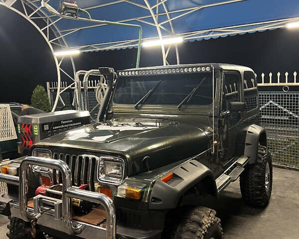 Зеленый Джип Вранглер, объемом двигателя 4 л и пробегом 90 тыс. км за 10500 $, фото 1 на Automoto.ua