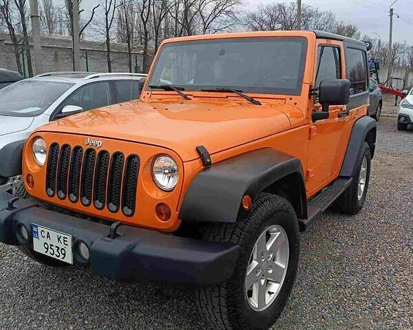 Помаранчевий Джип Wrangler, об'ємом двигуна 3.61 л та пробігом 169 тис. км за 17500 $, фото 1 на Automoto.ua