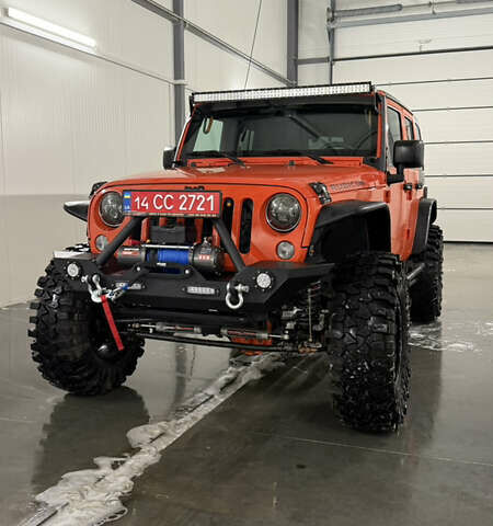 Оранжевый Джип Вранглер, объемом двигателя 3.6 л и пробегом 165 тыс. км за 26900 $, фото 1 на Automoto.ua