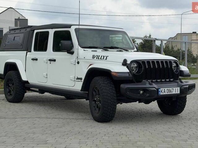 Білий Джип Gladiator, об'ємом двигуна 3.6 л та пробігом 51 тис. км за 51000 $, фото 1 на Automoto.ua