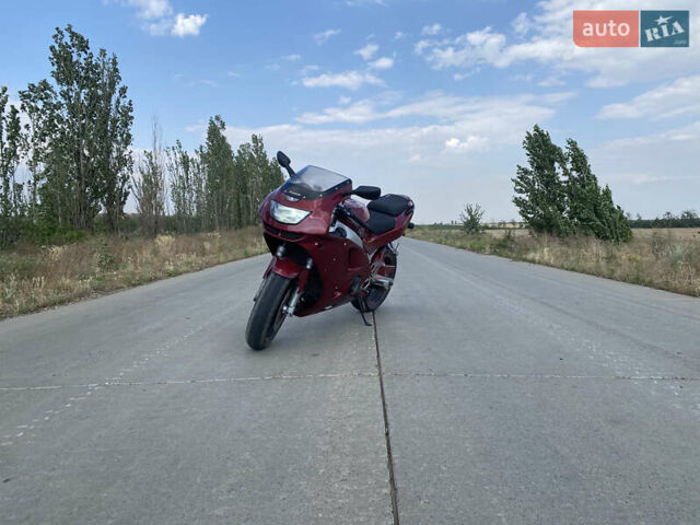 Красный Кавасаки Ниндзя, объемом двигателя 0.6 л и пробегом 53 тыс. км за 3100 $, фото 1 на Automoto.ua