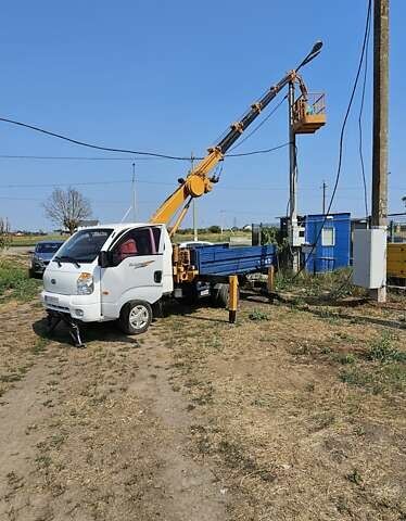 Белый Киа Бонго, объемом двигателя 2.9 л и пробегом 208 тыс. км за 20000 $, фото 1 на Automoto.ua