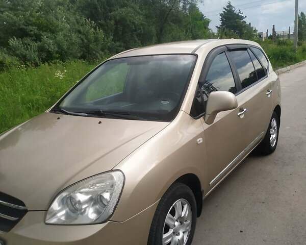 Бежевий Кіа Каренс, об'ємом двигуна 2 л та пробігом 320 тис. км за 6500 $, фото 1 на Automoto.ua