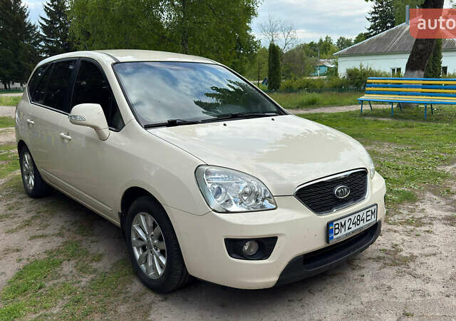 Бежевый Киа Каренс, объемом двигателя 1.99 л и пробегом 140 тыс. км за 7900 $, фото 1 на Automoto.ua