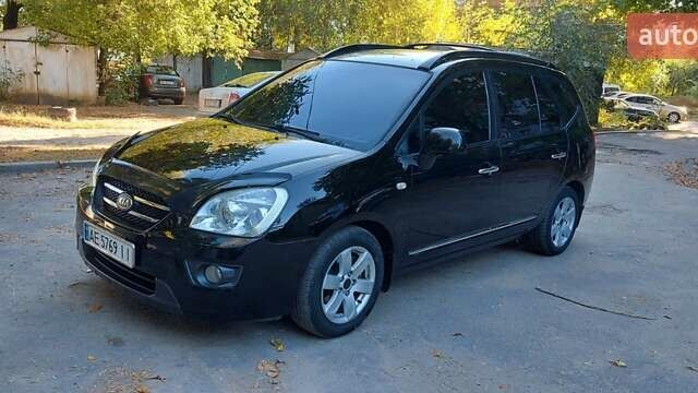 Черный Киа Каренс, объемом двигателя 1.99 л и пробегом 267 тыс. км за 5900 $, фото 1 на Automoto.ua