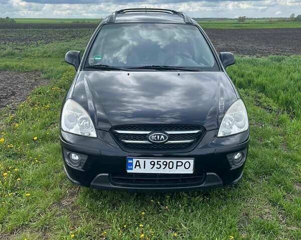 Черный Киа Каренс, объемом двигателя 2 л и пробегом 296 тыс. км за 7100 $, фото 1 на Automoto.ua