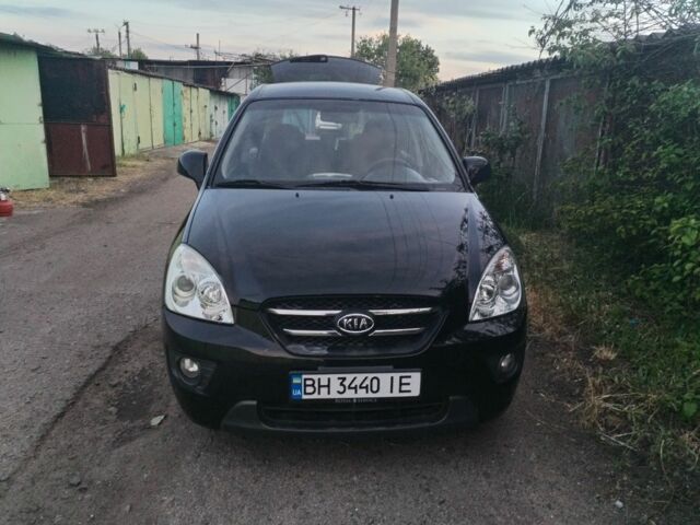 Чорний Кіа Каренс, об'ємом двигуна 2 л та пробігом 210 тис. км за 5800 $, фото 1 на Automoto.ua