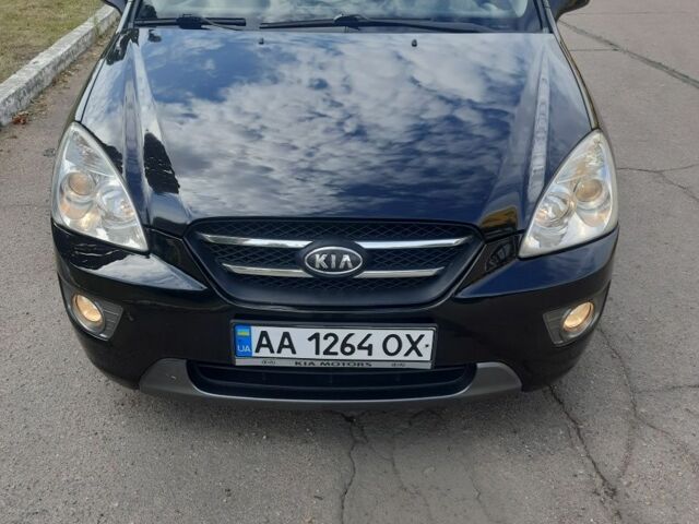 Чорний Кіа Каренс, об'ємом двигуна 2 л та пробігом 185 тис. км за 6000 $, фото 1 на Automoto.ua