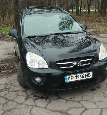 Чорний Кіа Каренс, об'ємом двигуна 2 л та пробігом 262 тис. км за 5999 $, фото 1 на Automoto.ua