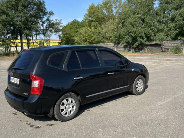 Чорний Кіа Каренс, об'ємом двигуна 2 л та пробігом 267 тис. км за 6200 $, фото 1 на Automoto.ua