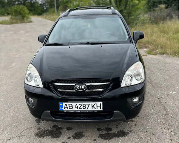 Черный Киа Каренс, объемом двигателя 2 л и пробегом 230 тыс. км за 5700 $, фото 1 на Automoto.ua
