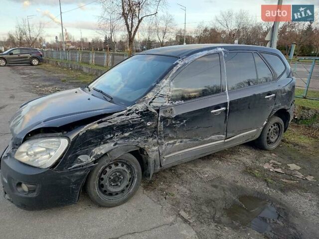 Черный Киа Каренс, объемом двигателя 2 л и пробегом 340 тыс. км за 3000 $, фото 1 на Automoto.ua