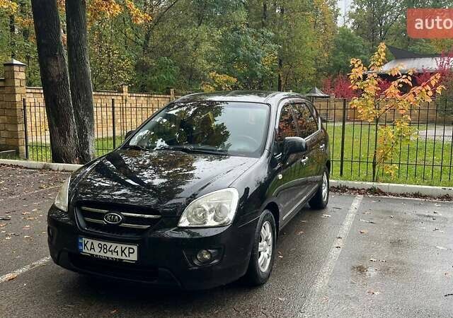 Чорний Кіа Каренс, об'ємом двигуна 2 л та пробігом 207 тис. км за 6500 $, фото 1 на Automoto.ua