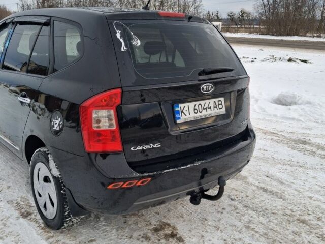 Чорний Кіа Каренс, об'ємом двигуна 2 л та пробігом 276 тис. км за 5500 $, фото 1 на Automoto.ua