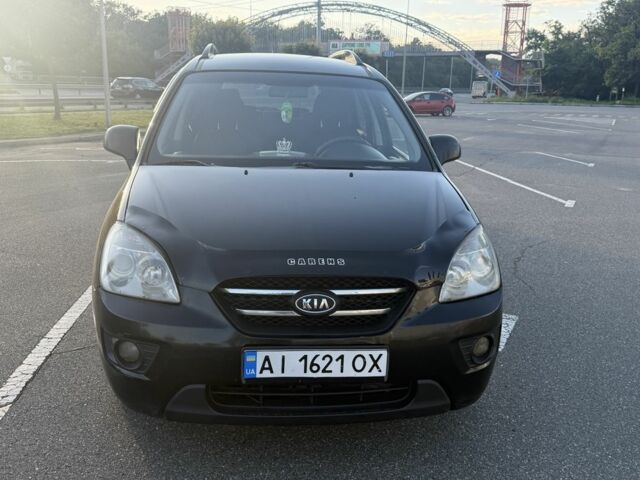 Чорний Кіа Каренс, об'ємом двигуна 2 л та пробігом 320 тис. км за 3800 $, фото 1 на Automoto.ua